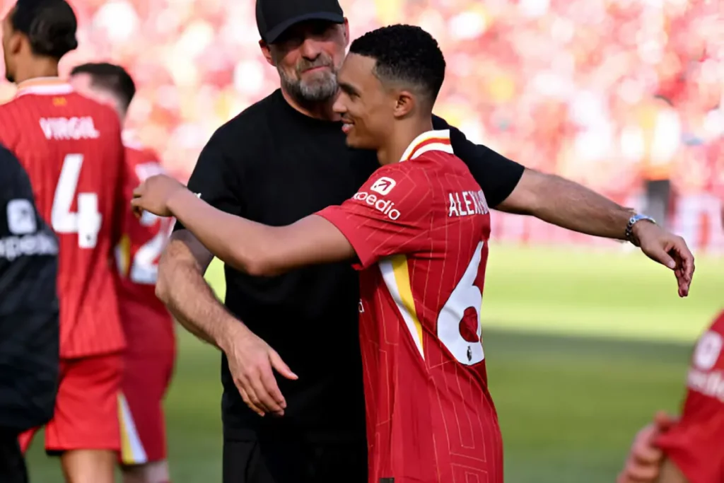 Trent Alexander-Arnold hugging Jürgen Klopp