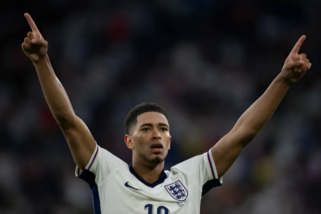 Jude Bellingham celebrates after scoring the equaliser for England